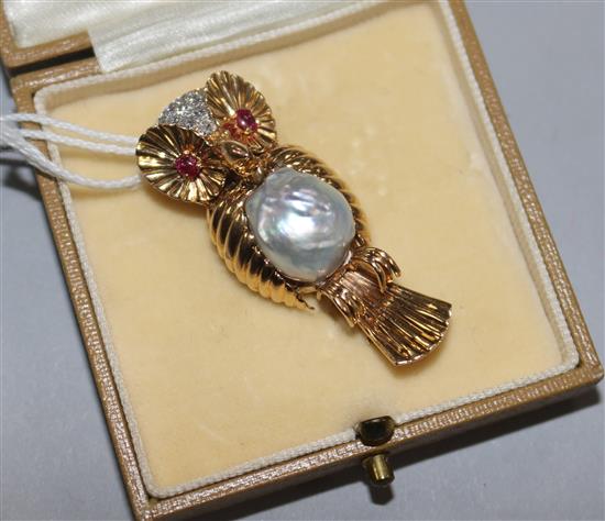 A French 18ct gold, ruby, diamond and baroque pearl set owl clip brooch, 4cm.